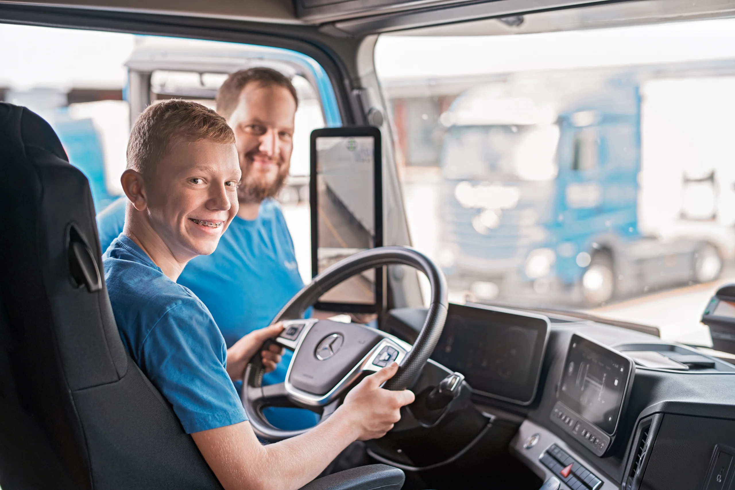 Woman with glasses in front of a group of people